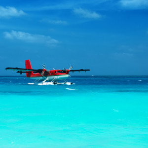 Twin otter red seaplane at Maldives